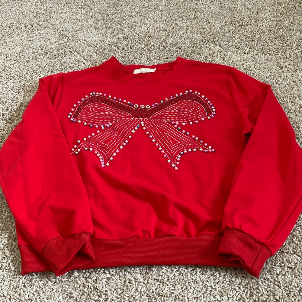 Red Sweatshirt with Bow Design
